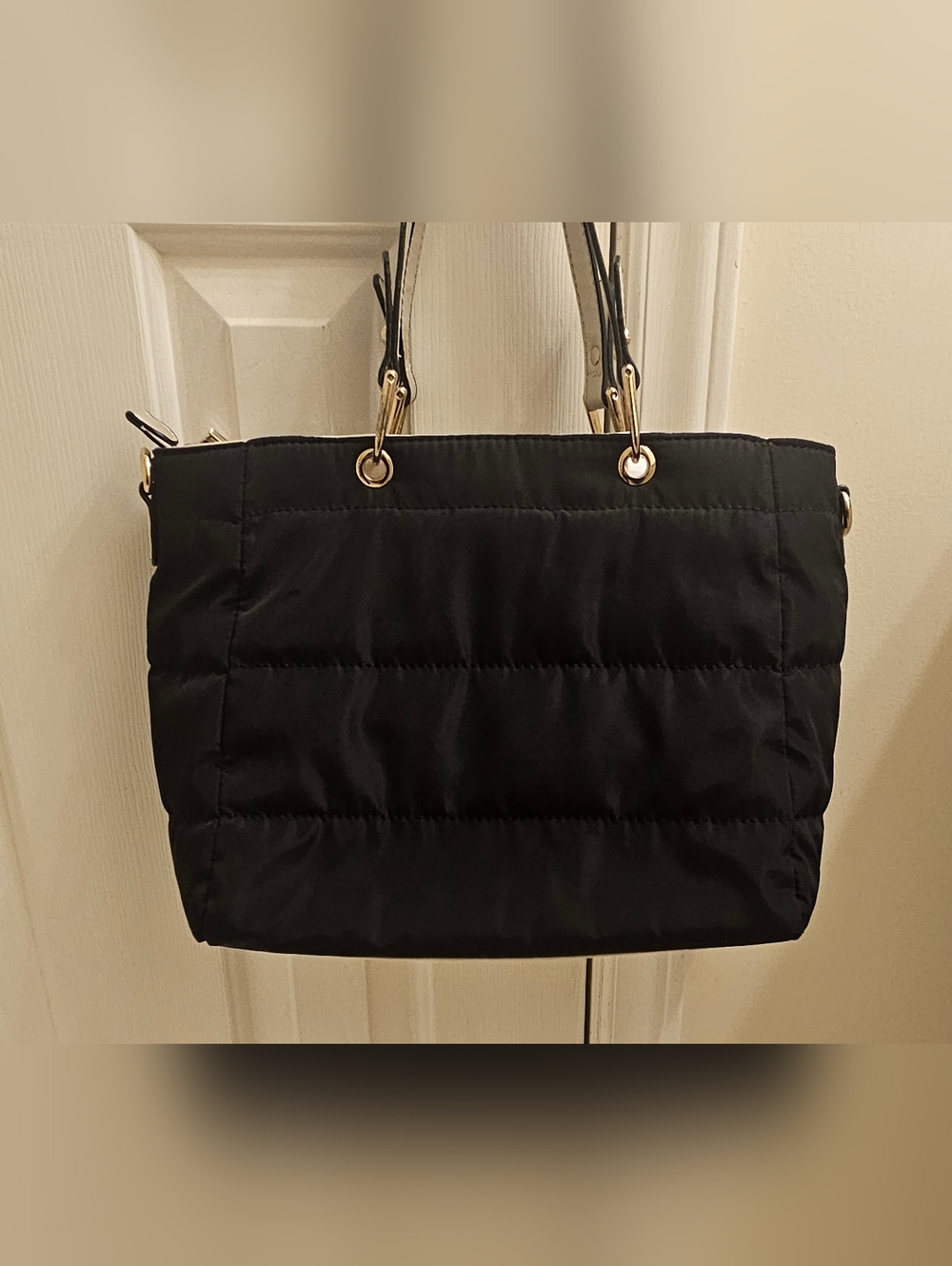Black quilted tote hand bag